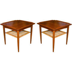 Pair of solid teak side tables with woven jute shelves Pair of solid teak side tables with woven jute shelves