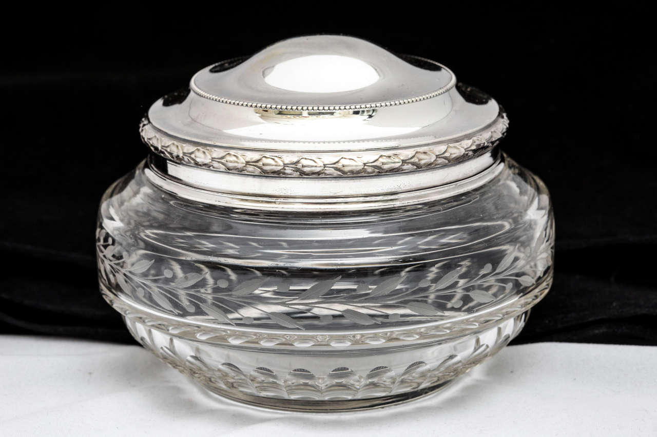 Art Deco, sterling silver and crystal powder jar, Paris, Ca. 1920's, E. Puiforcat - maker.The crystal jar is delicately etched with 