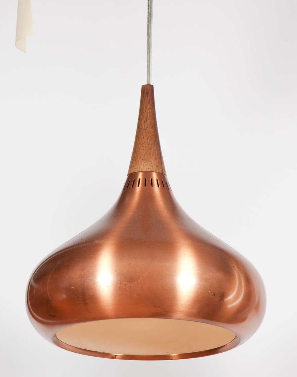 Vintage 1960s copper orange pendant by Jo Hammerborg.

This Fog & Morup hanging light is in excellent condition. The copper looks great but could use a polish if you prefer. Some people like a little patina. The copper is painted white on the