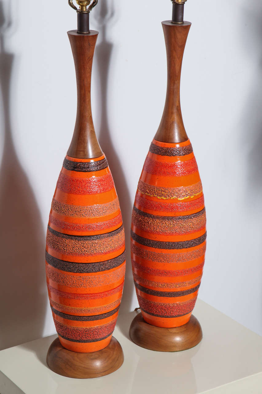 Italian Substantial Pair of Danish Modern Textured Orange Ceramic & Walnut Lamps, 1950s