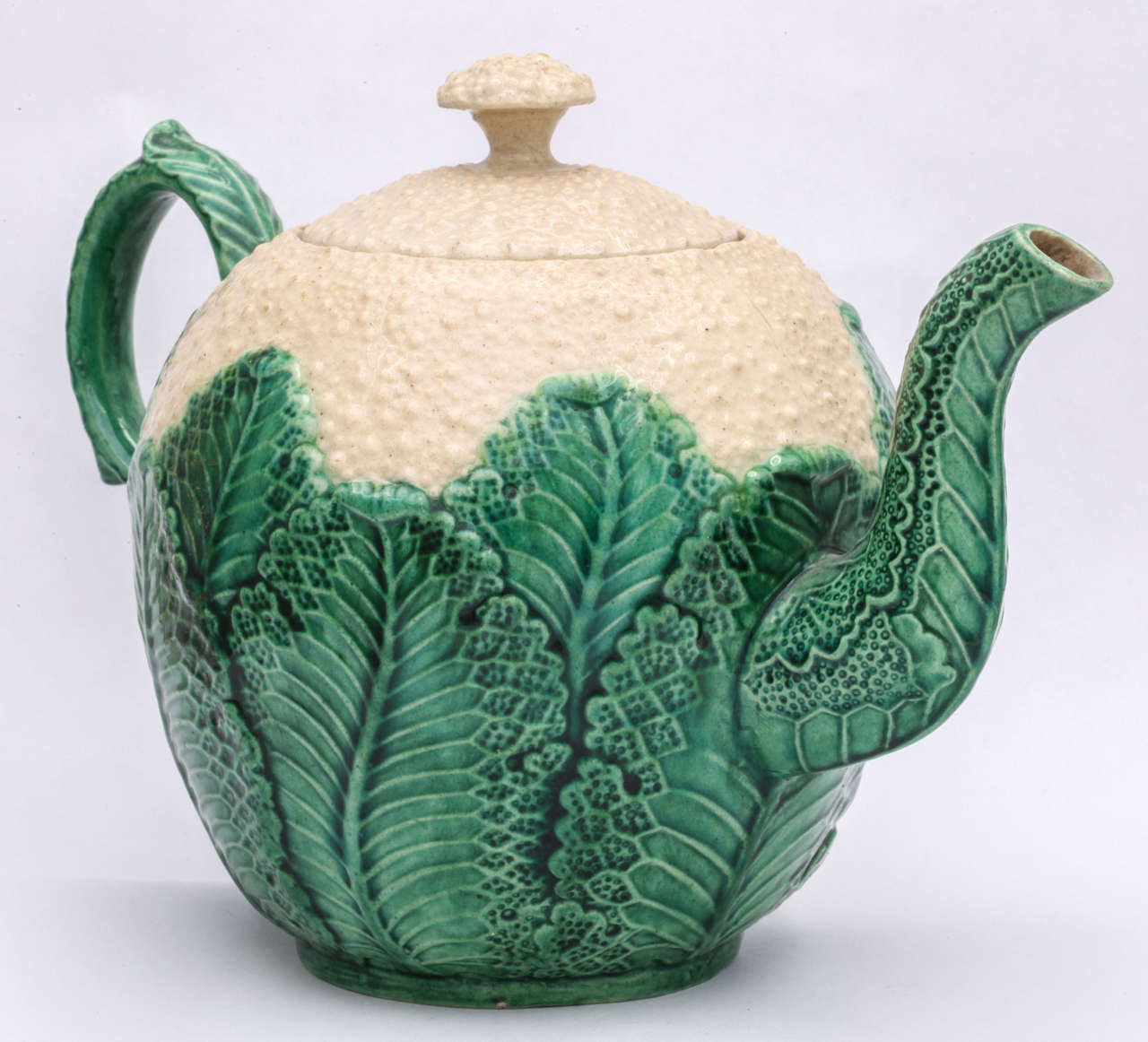 A fine English creamware (Whieldon school) pottery cauliflower teapot decorated in underglaze oxide colors.