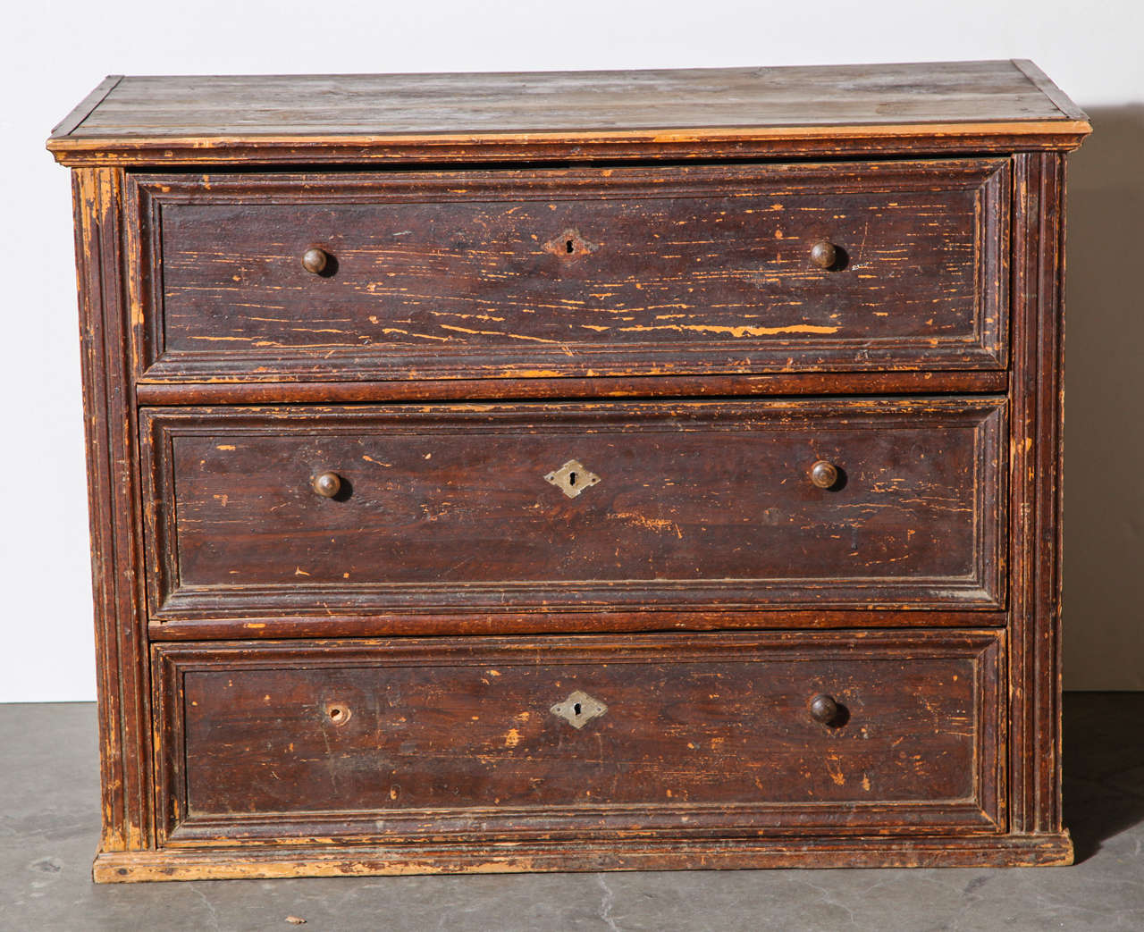 Large chest of drawers made in Belgium in the 19th century. Distressed but all drawers function. Original key included.