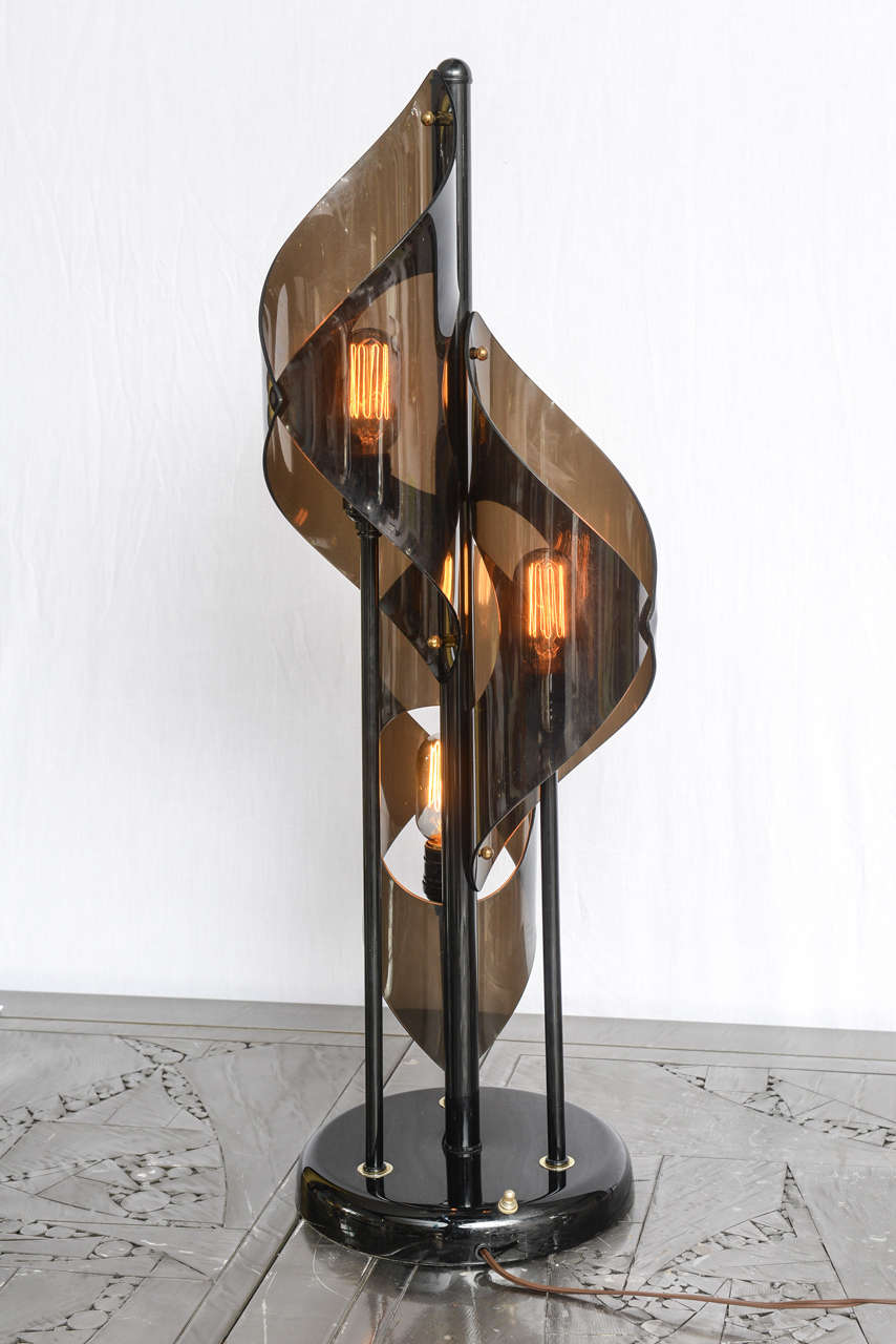 Most unusual, can use decorative and colored bulbs.
The Lucite is black.
Original condition