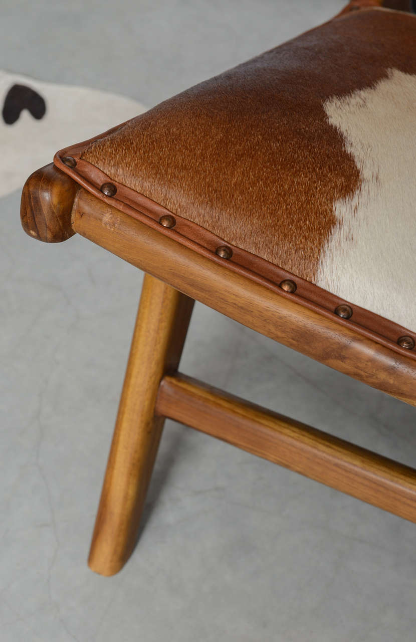 Cowhide Upholstered Teak Lounge Chair In Excellent Condition In Miami, Miami Design District, FL