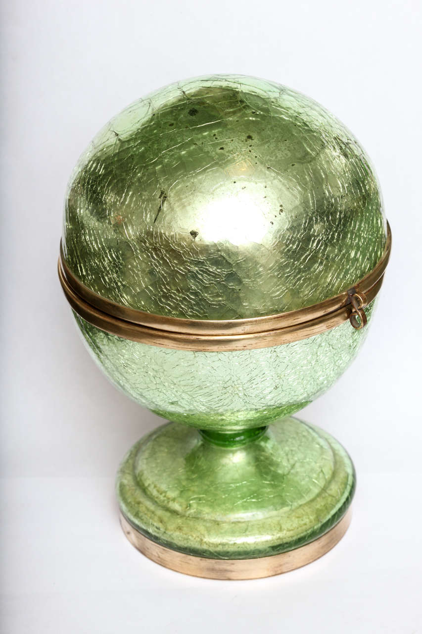 A wonderful crackle glass mirror ball decanter and shotglass cordial set with flip top. Three original glases and three replacements.