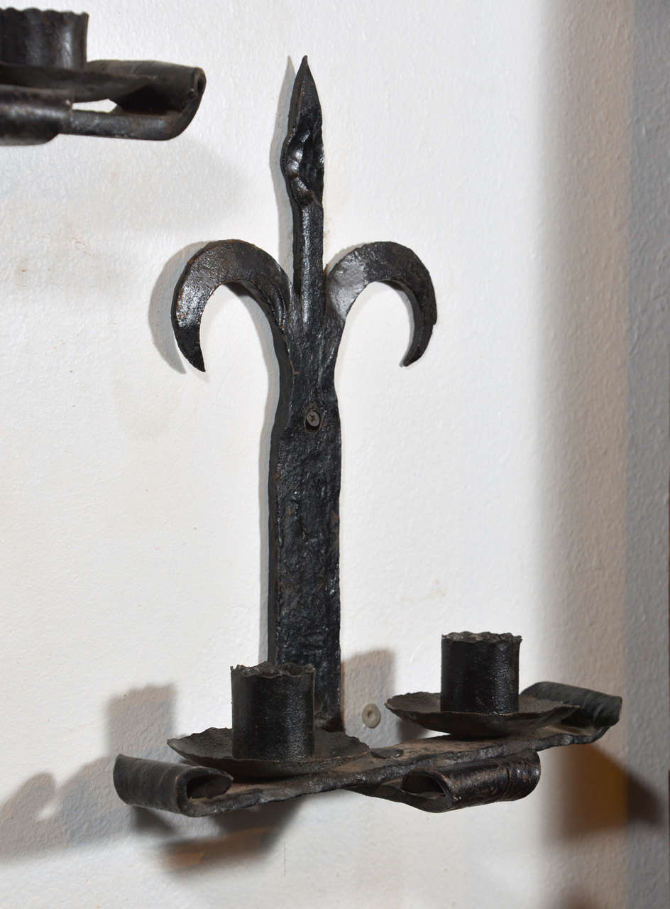 Pair of Antique Hand Forged Iron Fleur de Lys Sconces from France at 1stdibs
