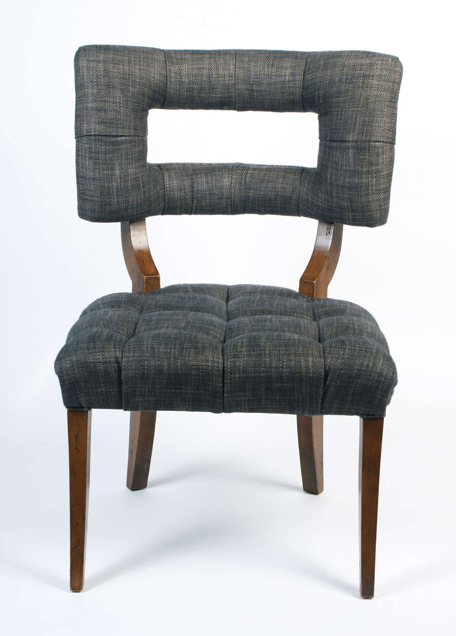 Late 20th century tufted gray tweed upholstered chairs.  Wood frame has distressed finish.  Taller silhouette than the traditional Williams Haines' chair.