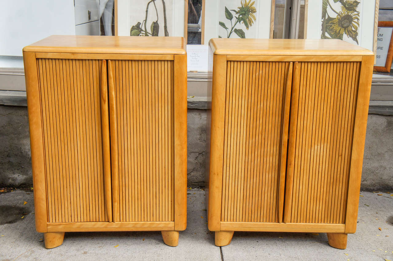A pair of rare Heywood-Wakefield wheat tambour door cabinets, stamped on reverse 