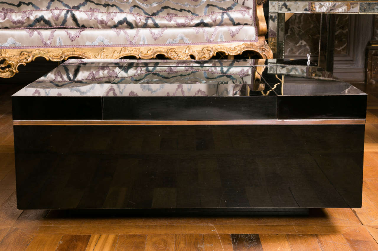 Lacquered black wood, steel and smoked mirror coffee table with adjustable top revealing