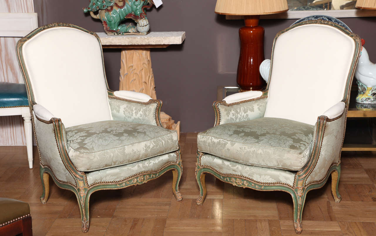French A Pair of Louis XV Style Carved and Painted Bergeres, France Late 19th Century