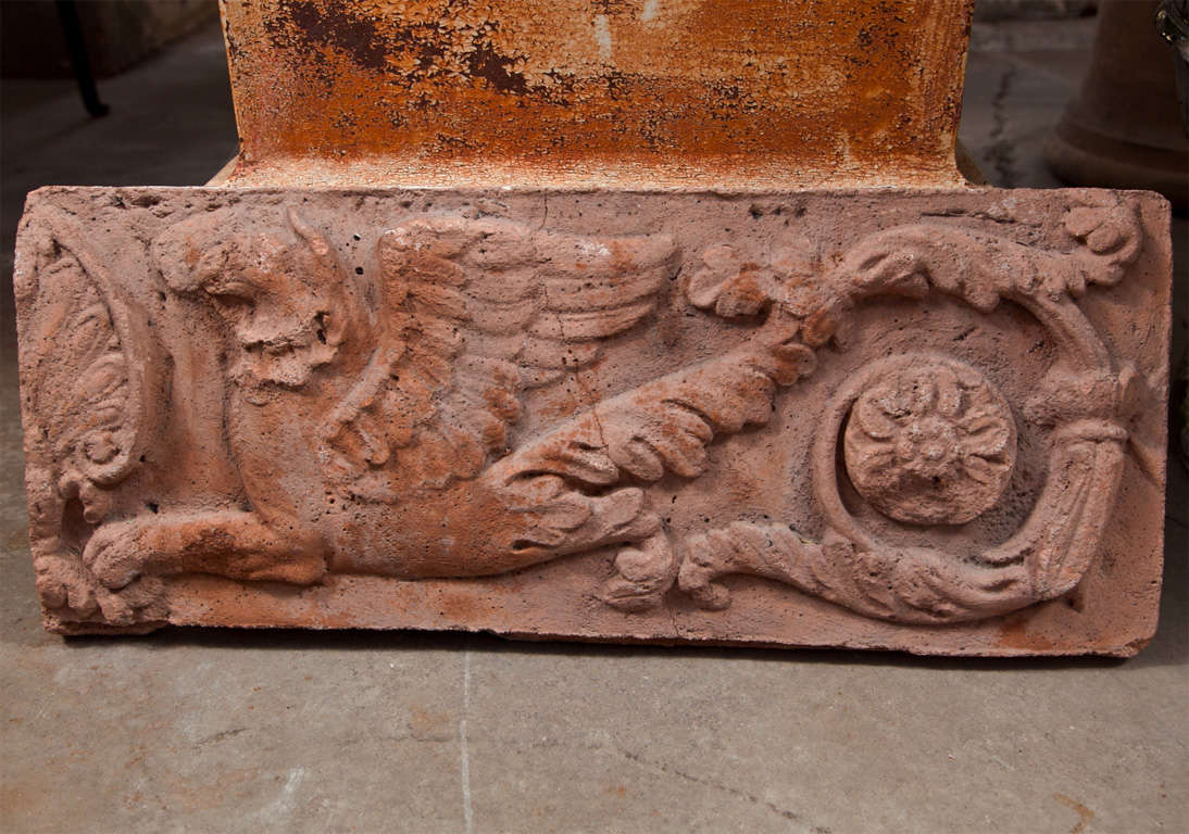 Mid-20th Century Pair of Opposing Terracotta Cast Stone Griffin Wall Plaques