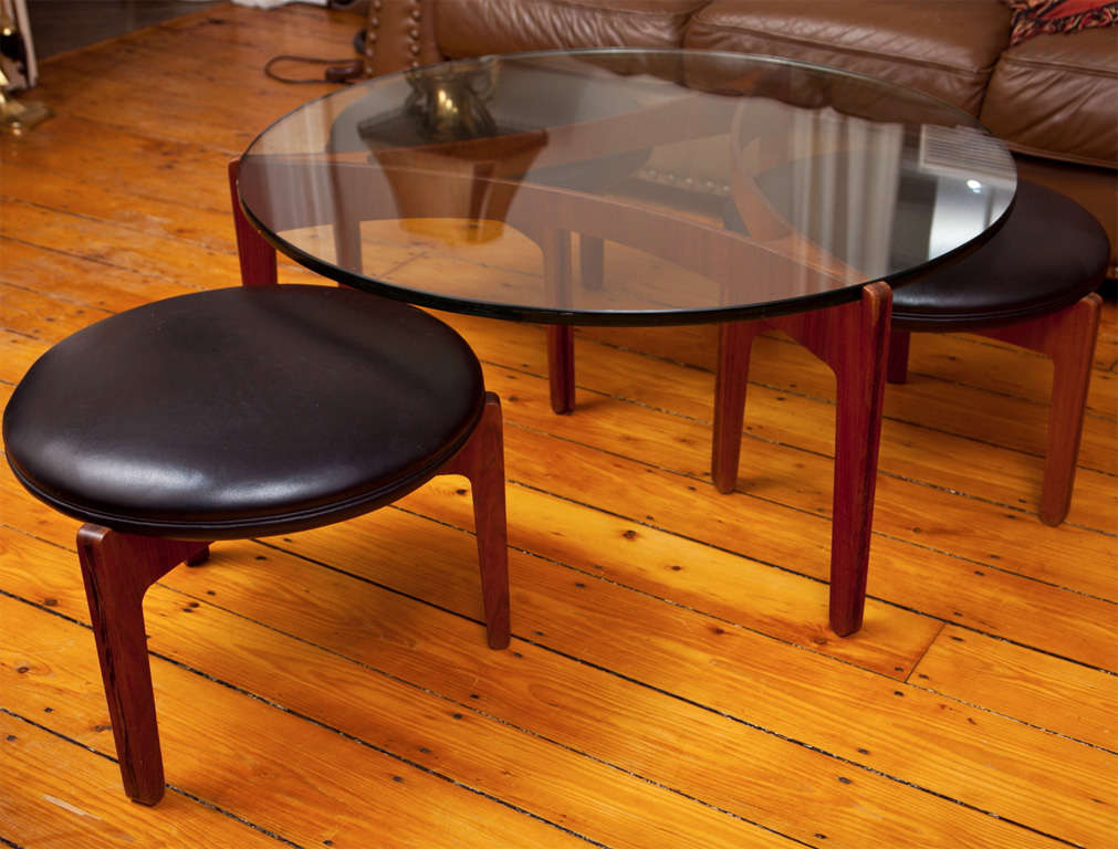 Designed by the renowned Danish designer, Sven Ellekaer in 1962, and made by Christain Linneberg Mobelfabrik, this is an all original, untouched and complete set, rarely found today. The highly figured solid rosewood legs of the stools and table