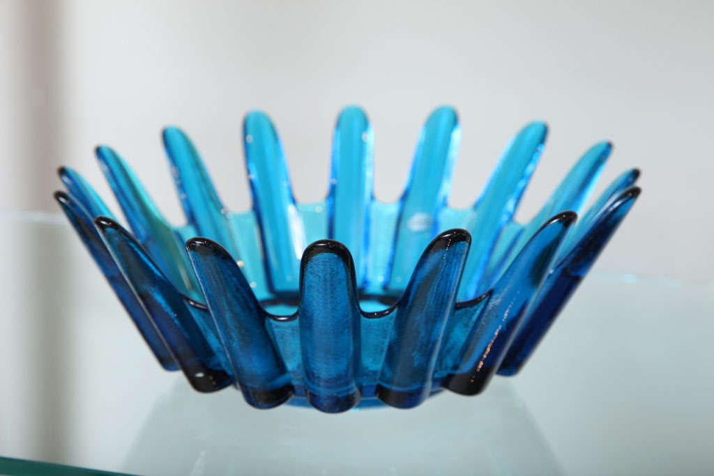 A fabulous bowl made by Blenko with a sculptural form in an eye-catching deep blue