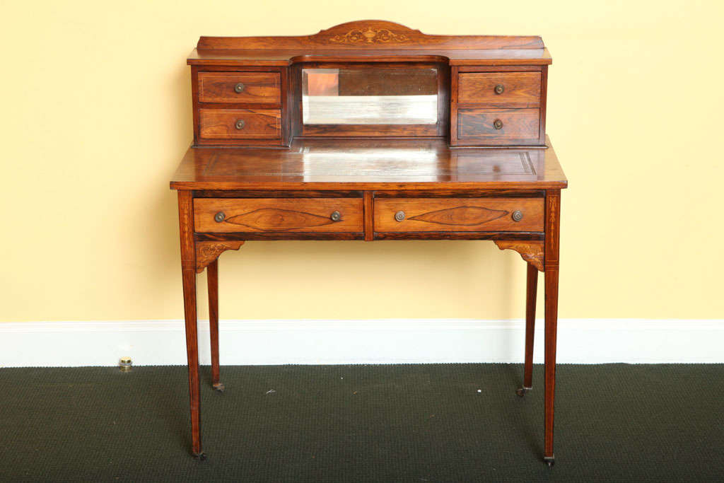 Edwardian lady's rosewood and inlaid writing table.