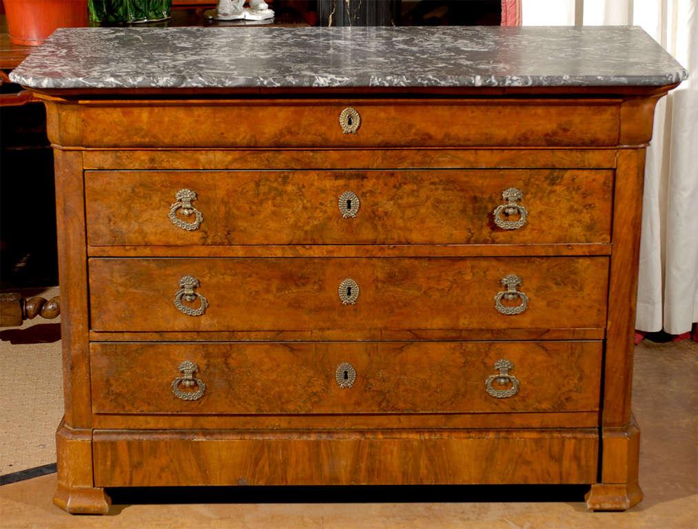 This is a handsome burled walnut 5 drawer (2 are hidden) Louis Philippe chest. This piece would be fabulous in an entry foyer, as a nightstand in a boudoir, or even as originally intended as a chest of drawers for your clothes.