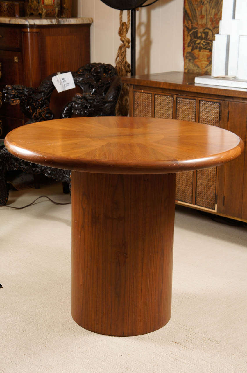 A Walnut Circular Center table