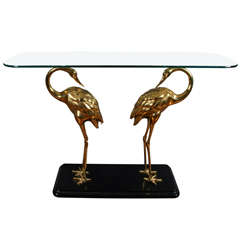 Table console élégante avec base en forme de héron