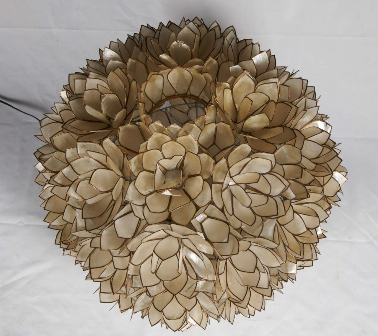 A 1970 chandelier made in mother-of -pearl lotus flowers