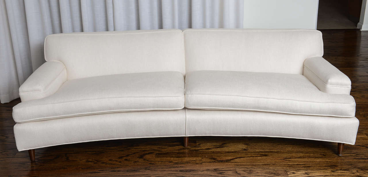 This stylish mid-century piece was designed by Edward Wormley for the Dunbar furniture company and has been completely restored and reupholstered in a white, linen-like textured and woven fabric.

Note: Seat cushions are held in place with clips (