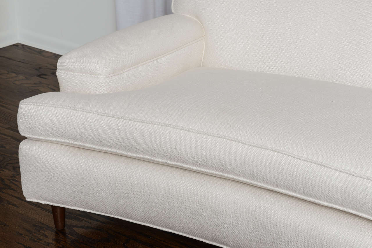 white curved sofa