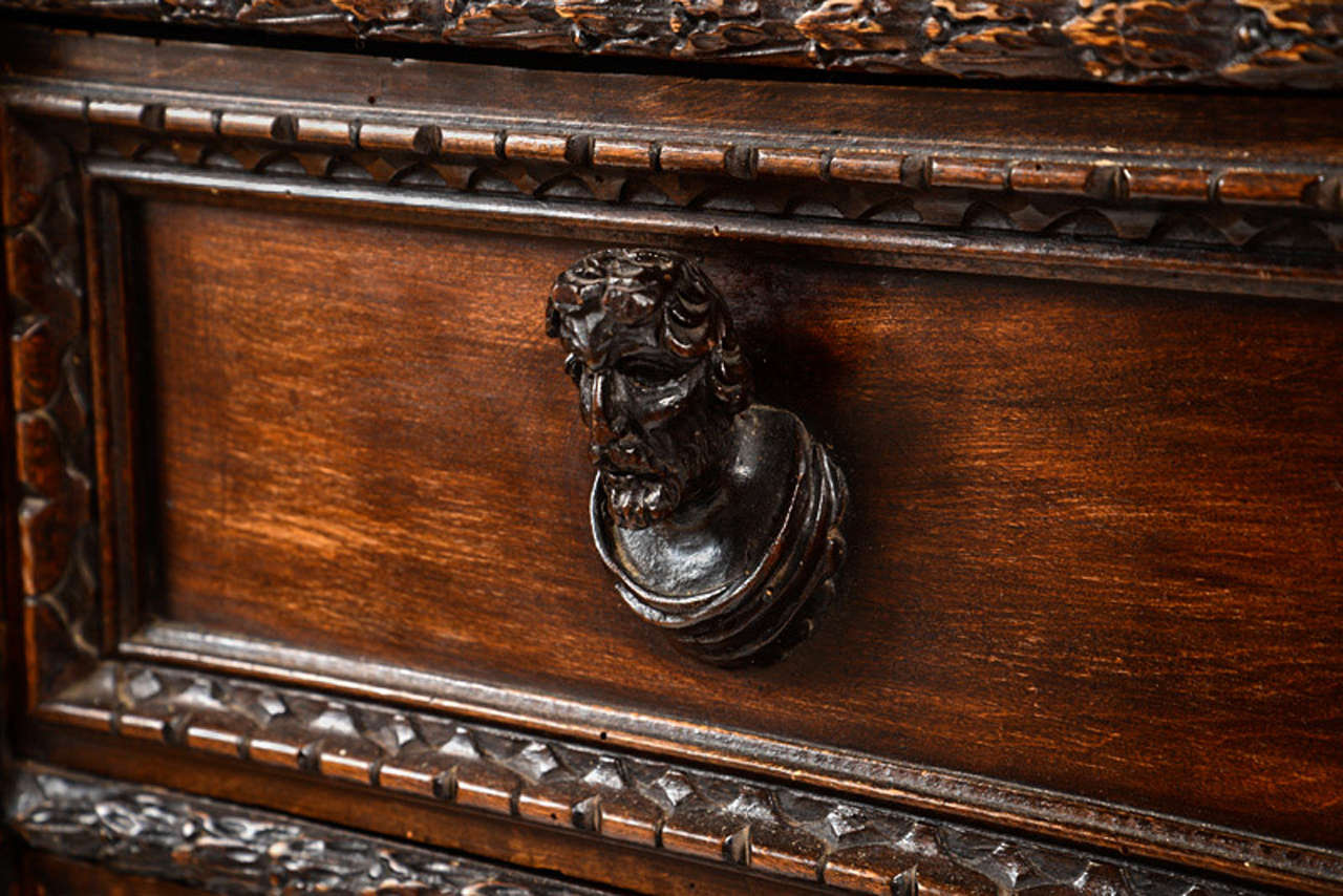 This large dramatic chest crafted in a late Renaissance or early Baroque form was made in the late 19th century. Made from antique original furniture or architectural paneling parts incorporated into a then new pieces designed to sell to wealthy