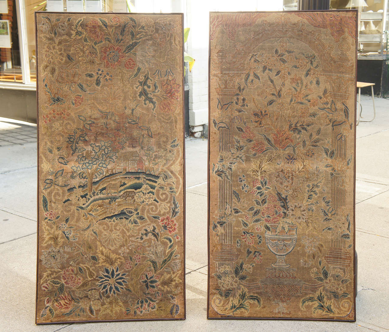 This lovely  pair of  needlework panels represent a women's  labor and  command at home decor which would have been important in establishing her social position. Worked in deep blues, reds ,ocher's and light greens the panels conform to stylish