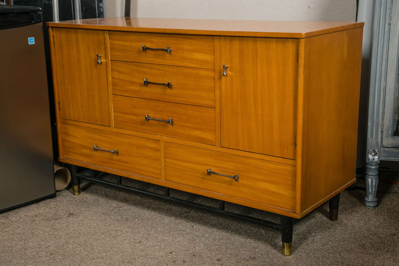 Pair of blond wood Drexel Mid-Century Modern chests. Milo Baughman in 1952 for Drexel  The combination of the top three drawers that sit between two doors, revealing two deep shelves for additional storage-along with, two bottom drawers sitting atop