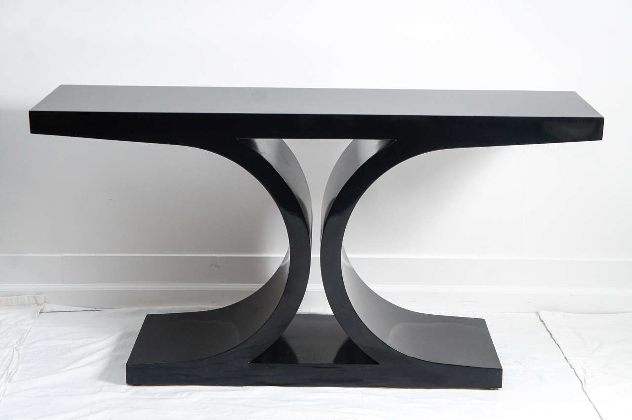 a perfect mid century modern console table in a black lacquer finish. 
the style is very Karl Springer.
the I-beam is my favorite console design. the condition is very good with a few light marks. sturdy and ready to go.