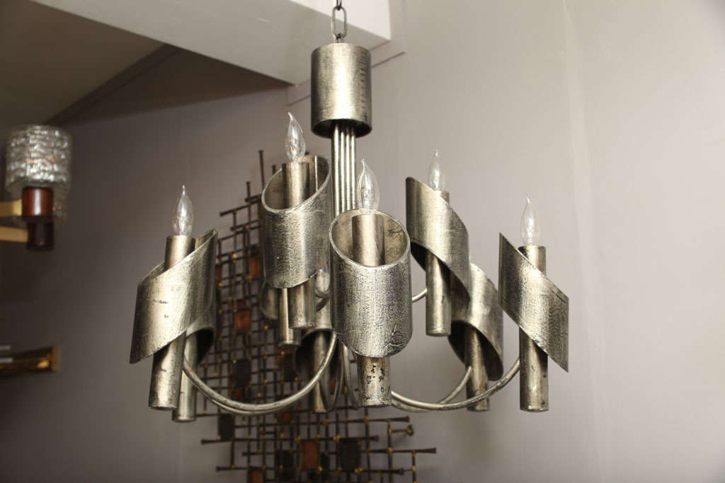 A 1960s brutalist patinated steel hanging fixture.