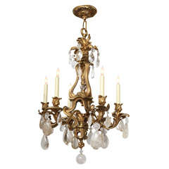 A French Louis XV Style Gilt Bronze 6 Light Chandelier.