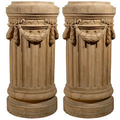Pair of French 19th. century carved oak pedestals
