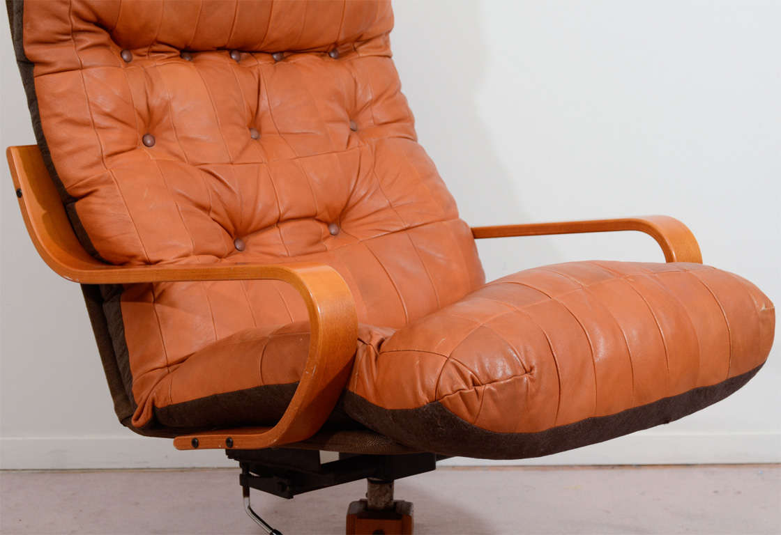 mid century leather swivel chair
