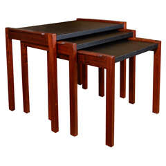 Set of Three Jens Risom Nesting Tables in Walnut with Black Vinyl Surfaces