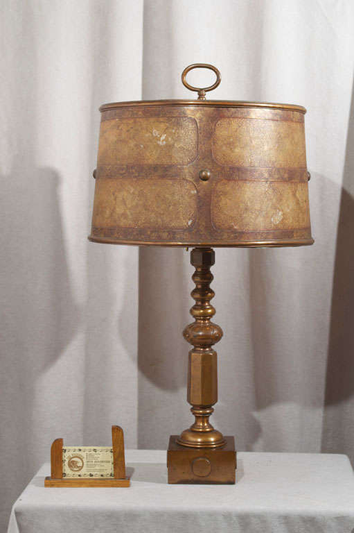 This unusual well-constructed table lamp is totally original.  The base and shade have always been together.  It is very rare to find a lamp like this that has kept its originality.  Note how the base and shade have that similar button design.  A