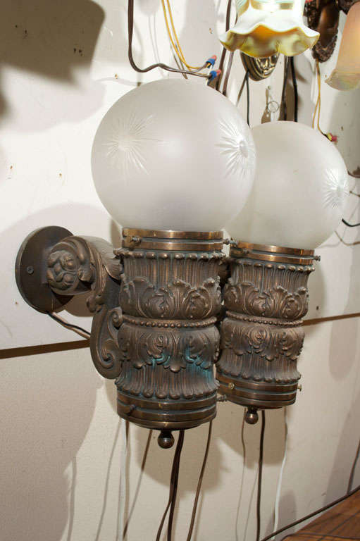 Heavily Cast Bronze Sconces with Pressed Glass Globes at 1stDibs