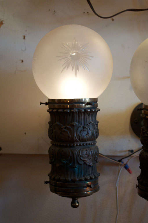 Heavily Cast Bronze Sconces with Pressed Glass Globes at 1stDibs