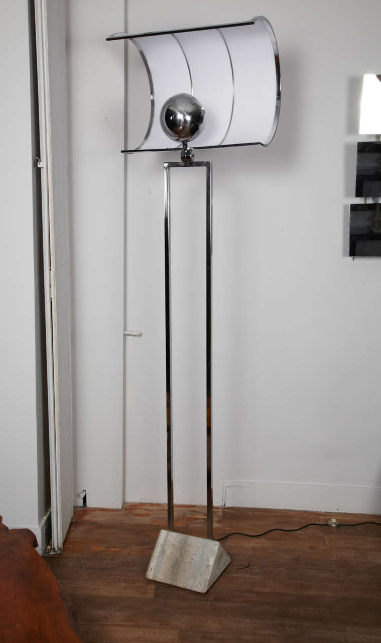 An unusual and highly decorative floor lamp with an adjustable 