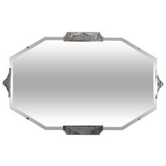 Palatial French beveled mirror with stylized geometric nickeled mounts