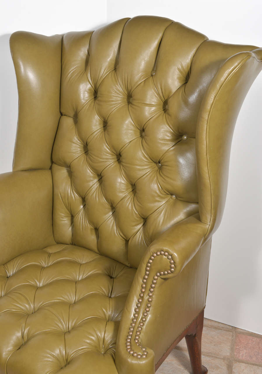 queen anne wingback chair leather
