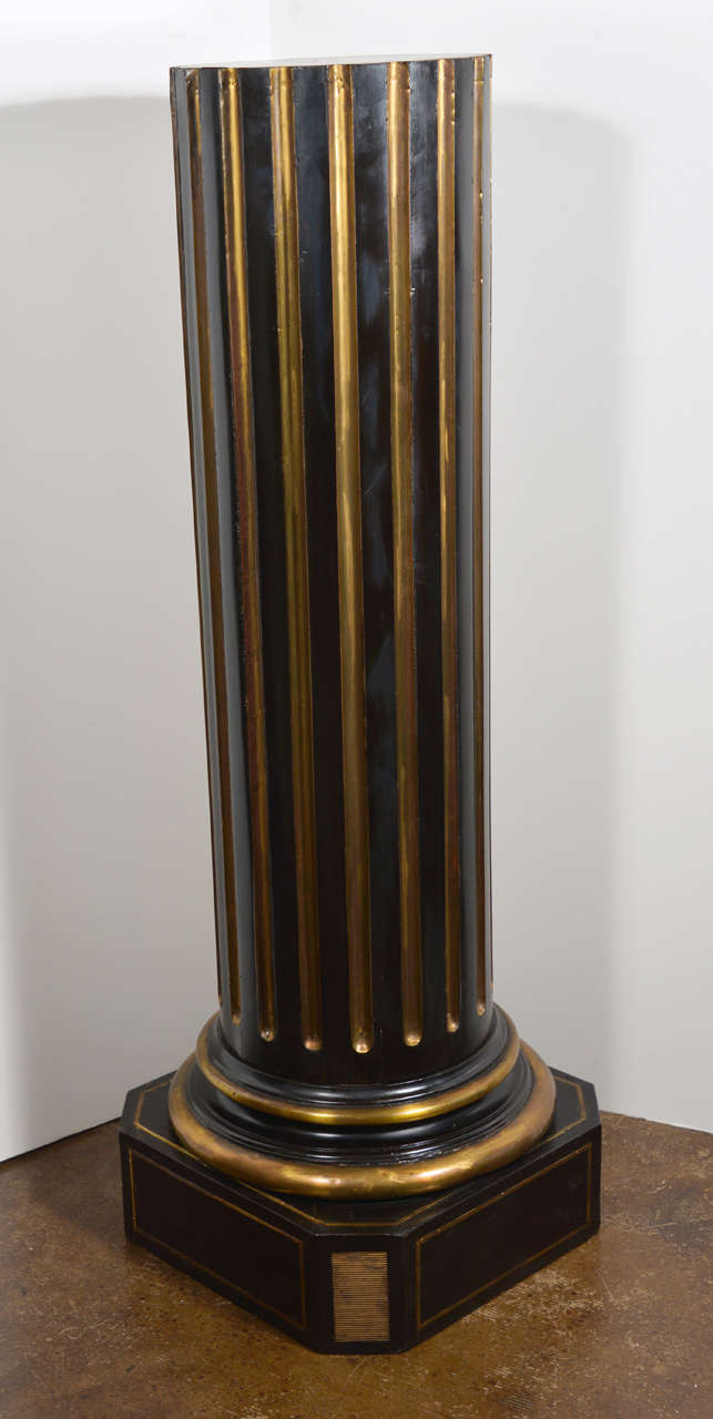 Pair of 19th century Baltic ebonized and brass inlayed pedestal.