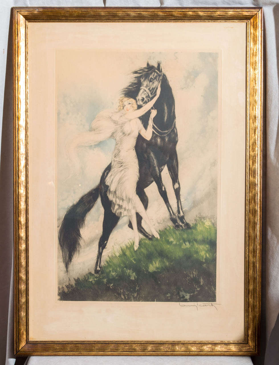 A fairly rare and beautiful etching by the well known artist, Louis Icart.  This example sells for quite stiff prices at auction.  We have seen prices as much as $8,900; quite often this etching brings in the $4,000 range.  We are really offering