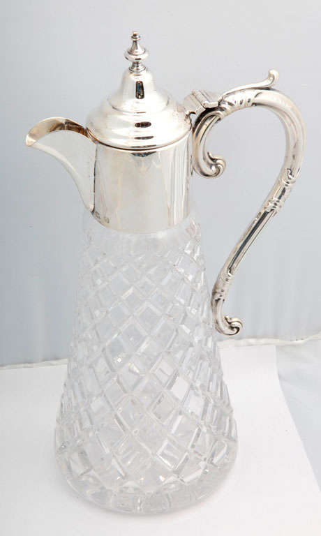 Sterling silver-mounted claret jug in the Victorian style, Birmingham, England, 1986, Charles S. Green & Co., makers. Measures: 13