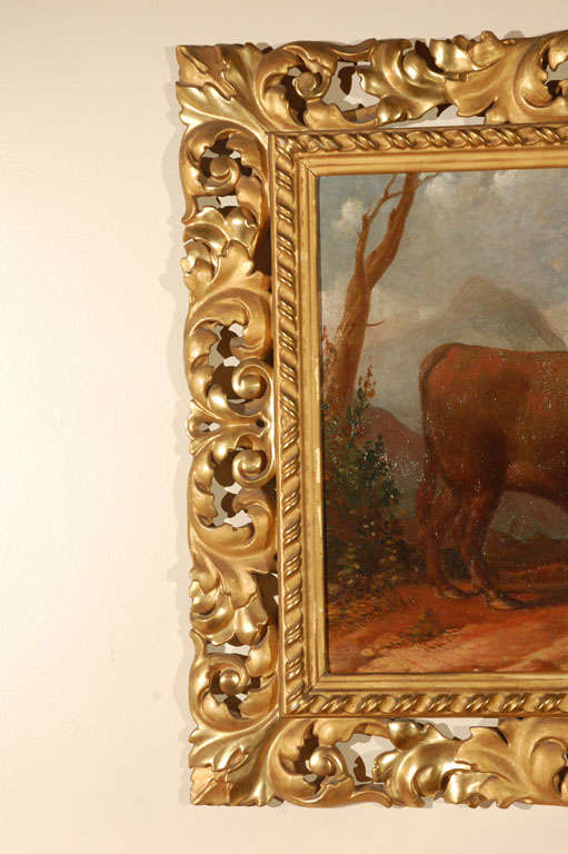 Fine pair of mated, original oil on linen paintings of bulls in pastoral landscapes with hand-gilded, hand-carved, pierced Florentine frames.