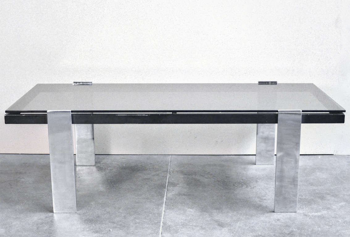 Very nice Italian cocktail table with black crystal top and chrome structure. Attributed to Cassina.