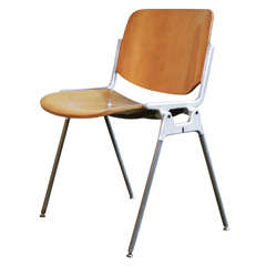 Used Twelve Chairs by Giancarlo Piretti.