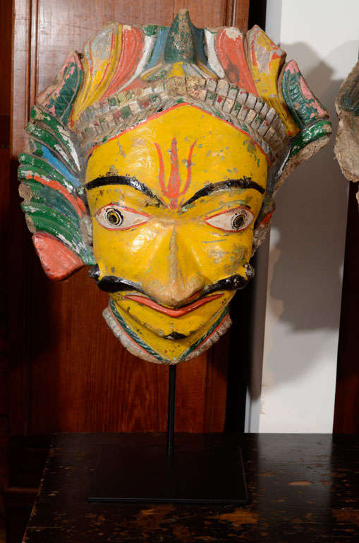 Large, colorful festival masks of Shiva & his consort Parvati. From Central Indian province of Maharasthra, these papier mache masks would be used in religious festivals and parades. Sold individually or as a pair.