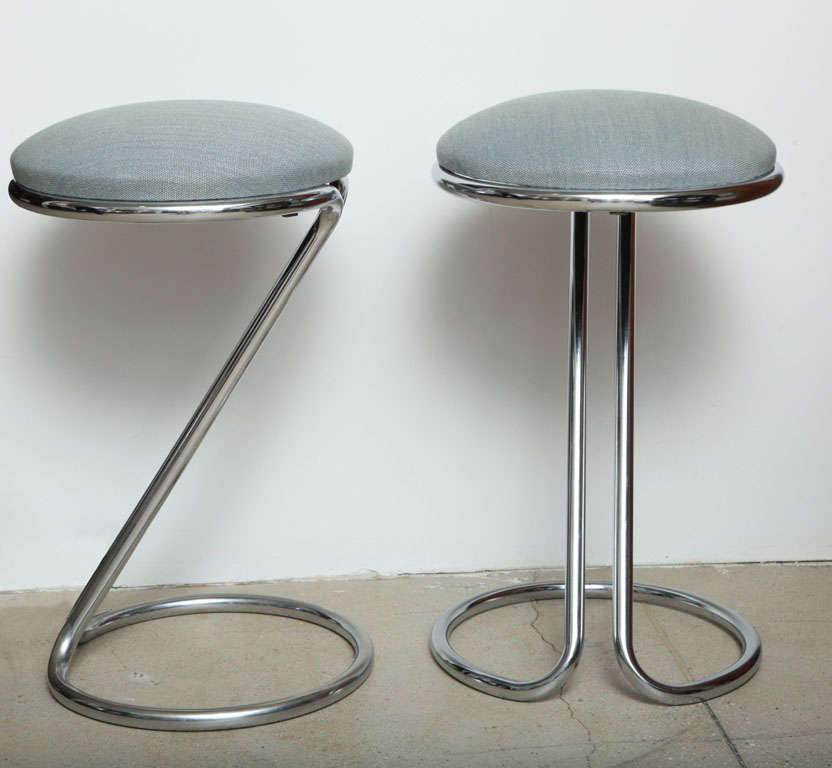 Z-shaped counter-height chrome bar stool by Gilbery Rohde for Troy Sunshade. USA, circa 1950.  Up to six (6) stools available; priced individually.  Offered in choice of new blue-grey cotton/linen fabric or in COM / COL (Client's Own Material or