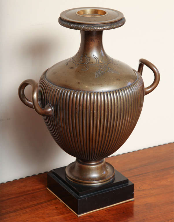 19th century Neo-Classical bronze urn on a marble base