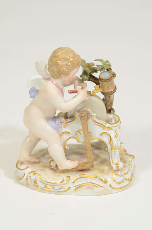 German 19th Century Meissen Figurine of Cupid on Pinwheel For Sale