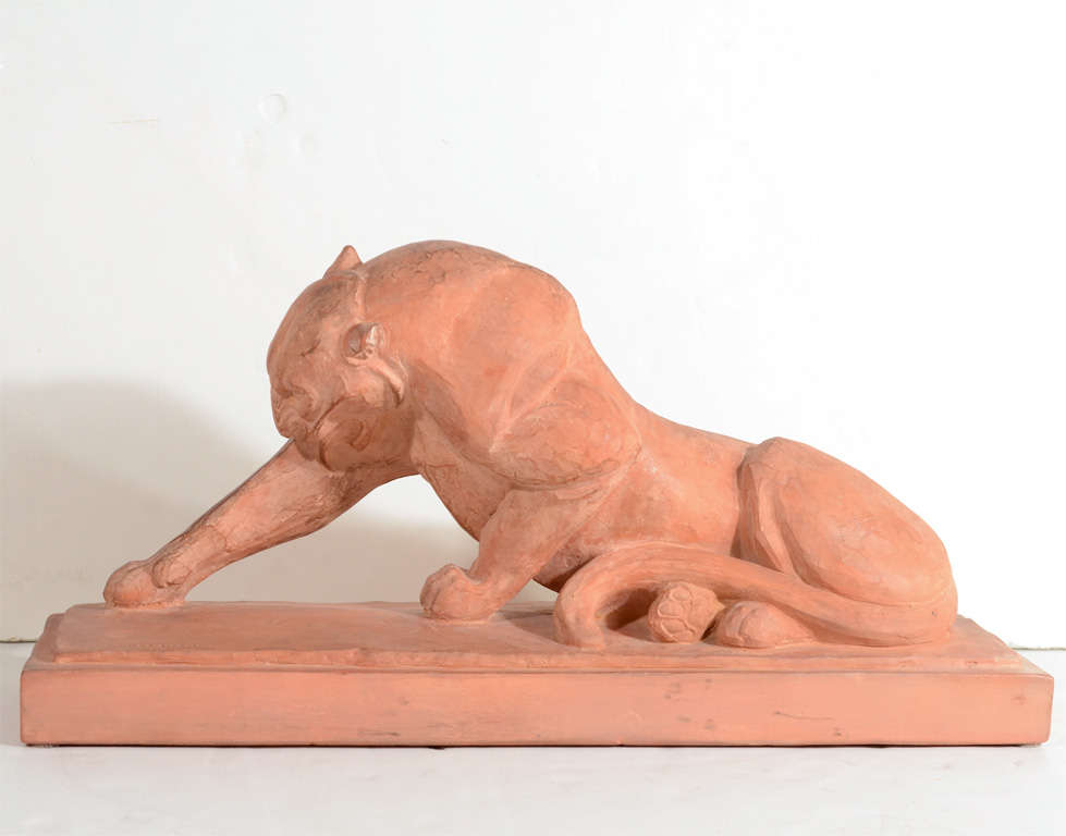 Striking, unique and perfectly detailed terra-cotta sculpture titled: Panther Licking Its Leg.
Sculpted by Andre Vincent Bequerel. This piece is documented as well and signed as well.